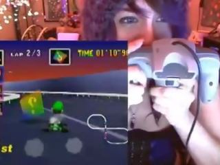 Geek damsel cums playing Mario Kart