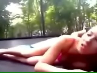 Voluptuous young schoolgirl Fucks on a Trampoline