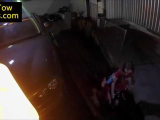 Stranded girls railing tow truck driver member