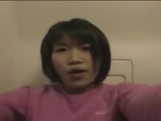 Japanese young lady Masturbates In Airplane Bathroom