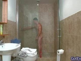 Smashing muscled buddy jerking under shower